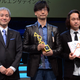 Illustration for article titled A Konami PR Person Just Got a iMetal Gear Solid V/i Award Instead of Hideo Kojima